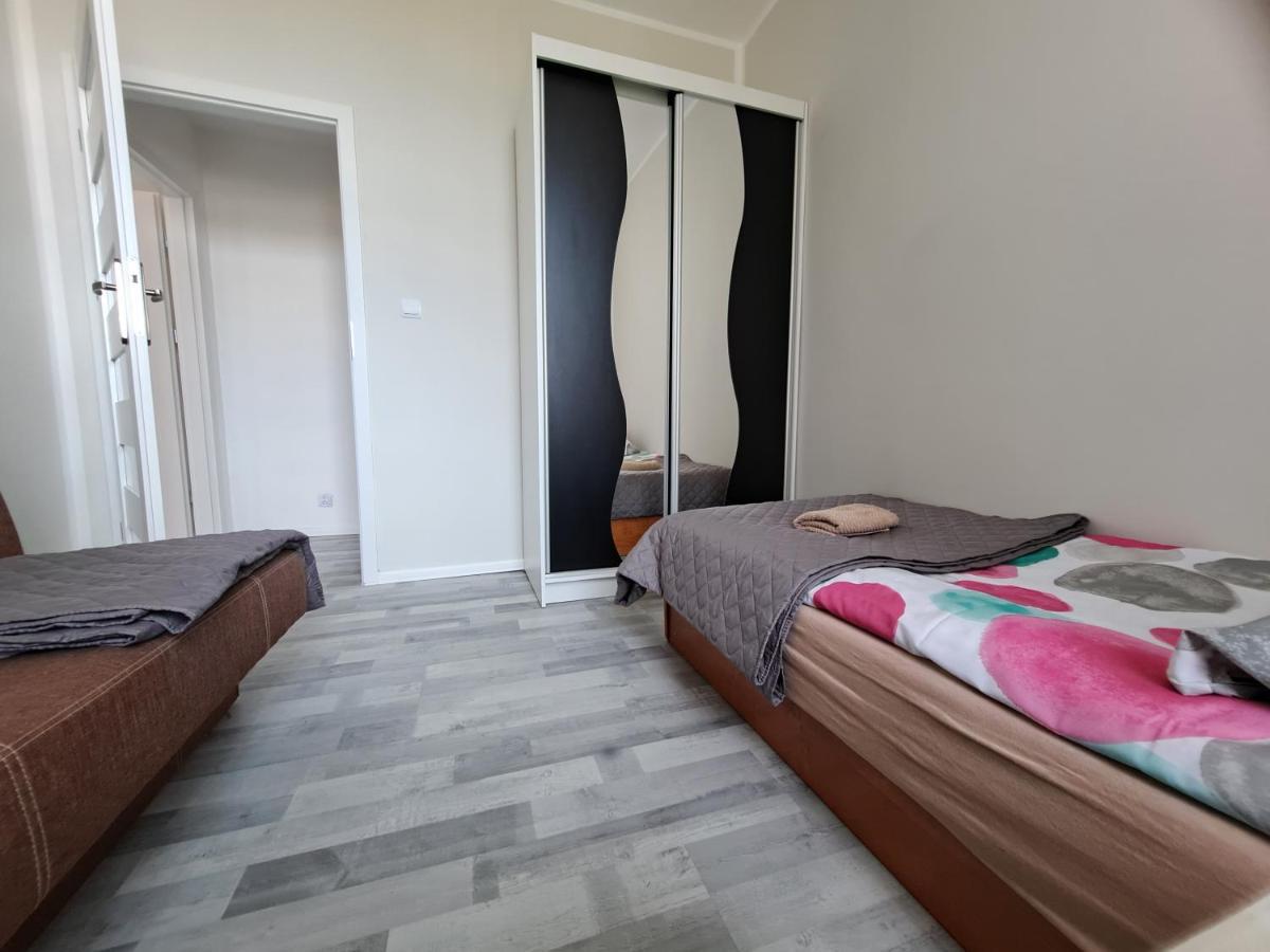 Appartement Apartament Przy Parku à Giżycko Extérieur photo